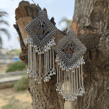Shiny Silver Jhumka Earrings: Traditional Treasures - Bilzz.in