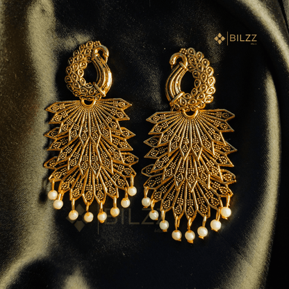 Golden Jhumka Earrings: Regal Beauty for Every Occasion - Bilzz.in