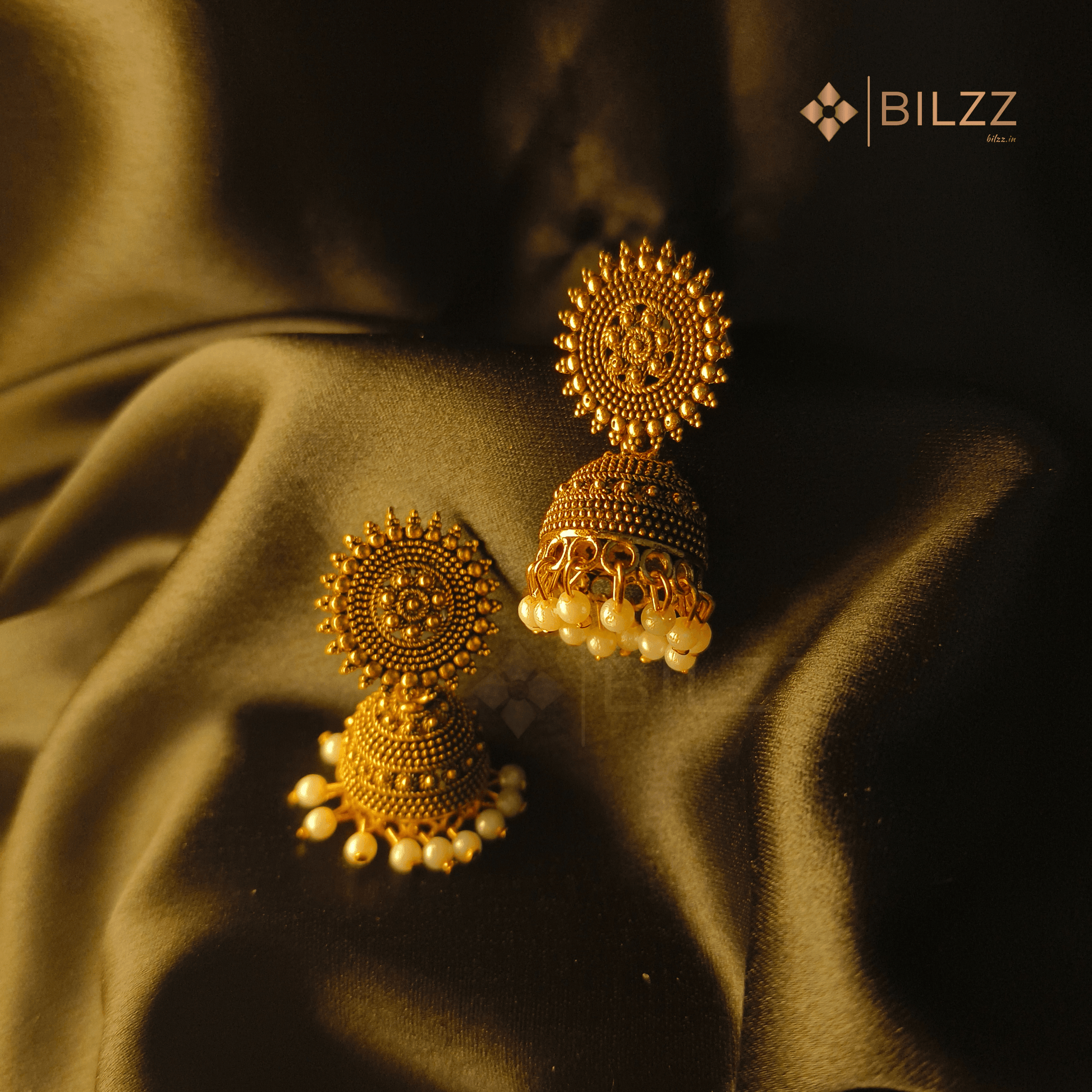 Golden Jhumka Earrings: Timeless Ethnic Charm with White Beads - Bilzz.in